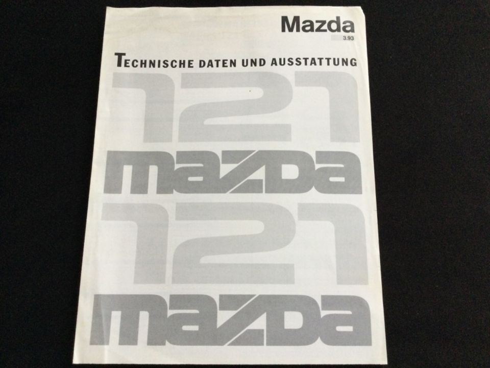 Mazda 121 GLX und Canvas Prospekt technische Daten von 1993 in Kiel