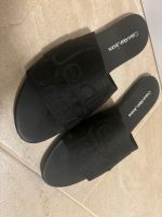 Calvin Klein Jeans Pantoletten schwarz Gr. 40 Latschen Schuhe Brandenburg - Bad Belzig Vorschau