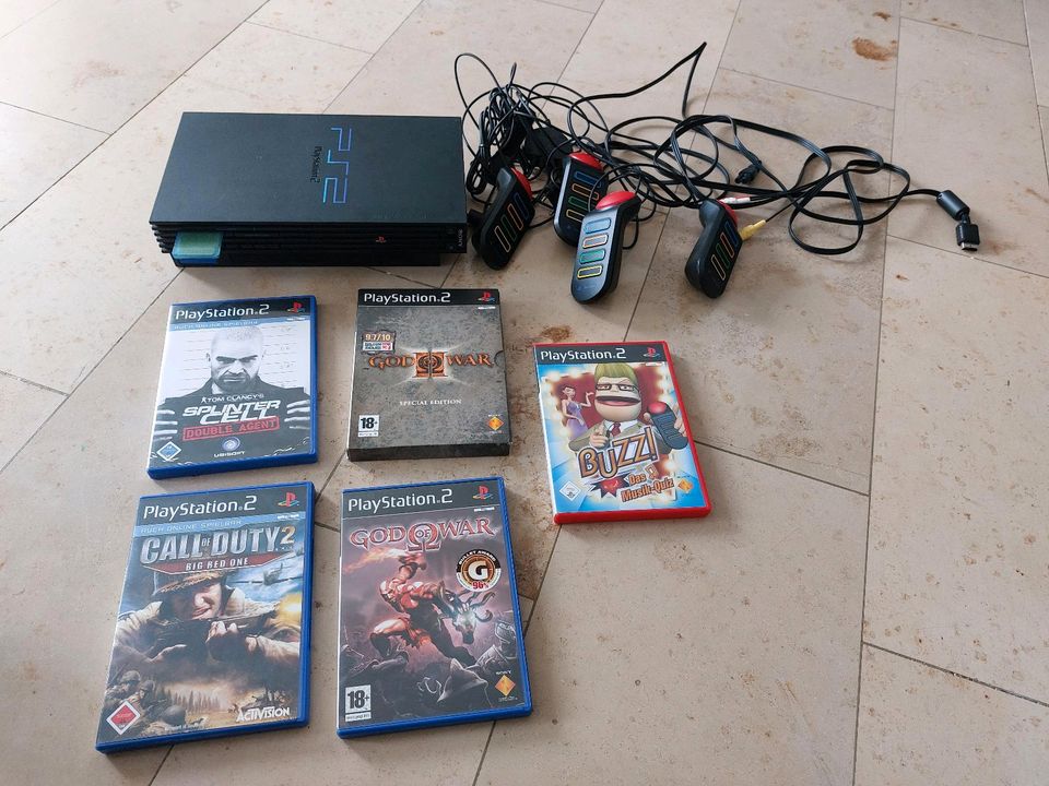 Playstation 2 mit 5 Spielen in Langenfeld