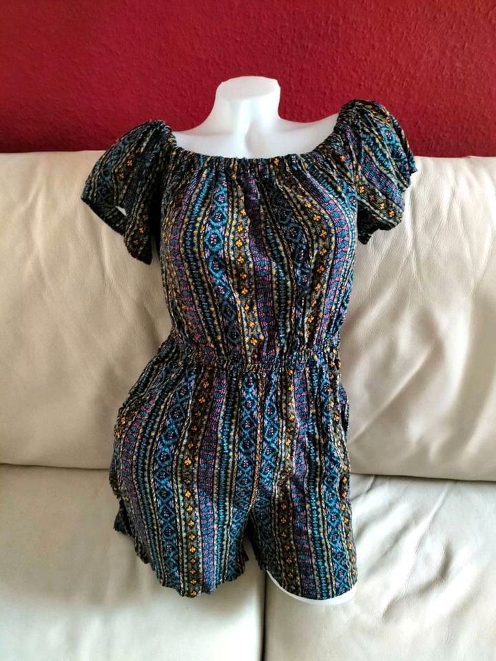 Jumpsuit mit Muster Volantärmel marineblau schwarz violett lila in Schwieberdingen