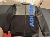 Jacke Jogginganzug Trainingsjacke Adidas Gr. 128 schwarz grau Nordrhein-Westfalen - Elsdorf Vorschau