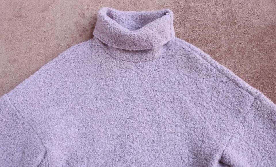 Gauchere Pullover aus Bouclé aus Wolle in München