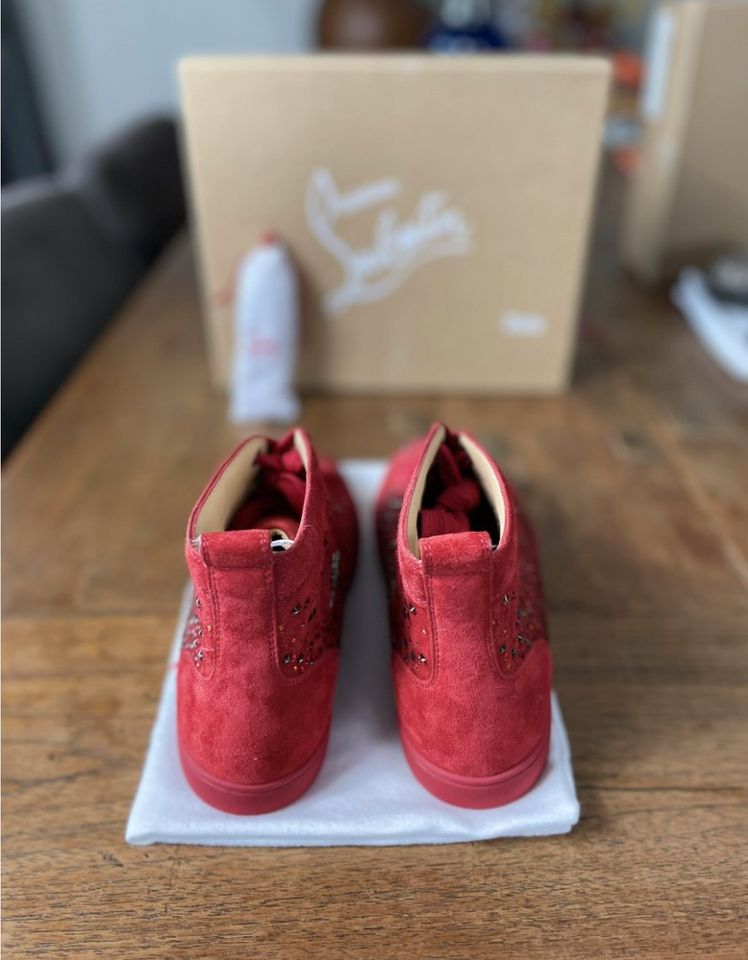 ' Neu' Christian Louboutin High Top Sneaker Gr. 38,5 rot in Wolfsburg