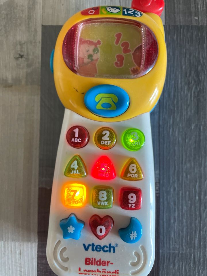 VTech Kinder Handy mit Soundeffekten in Königsbach-Stein 