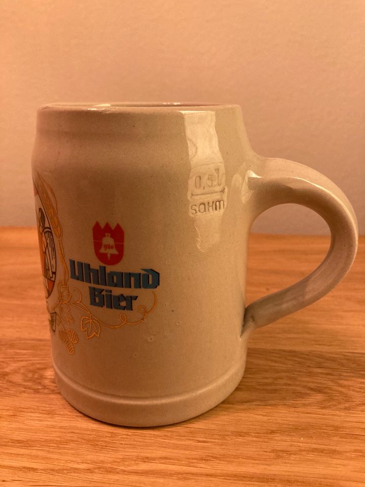 Bierkrug 0,5l „Uhland Bier“ (Steinkrug) in Stein