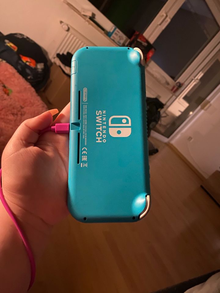 Nintendo Switch Lite in blau mit 32gb in Brevörde