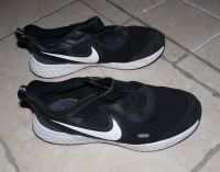 Kinder Nike Turnschuhe Größe 33 schwarz Sachsen - Reinsdorf Vorschau