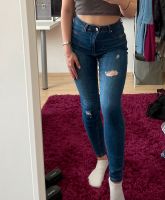 Skinny Jeans mit Löchern Bayern - Diespeck Vorschau