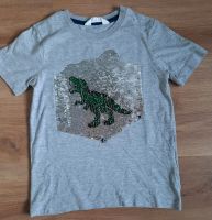 T-Shirt grau H&m 122/128 Wendepailetten Nordrhein-Westfalen - Bad Laasphe Vorschau