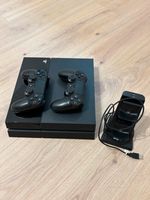 PlayStation 4 inkl. 2 Controller und Ladegerät Baden-Württemberg - Gäufelden Vorschau