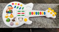 Baby Gitarre mit Musik ( batteriebetrieben) Saarland - Wadgassen Vorschau