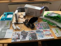 WII-Paket mit Konsole, Balanceboard, 8 Spiele, 2 Mikrofone etc. Hessen - Malsfeld Vorschau