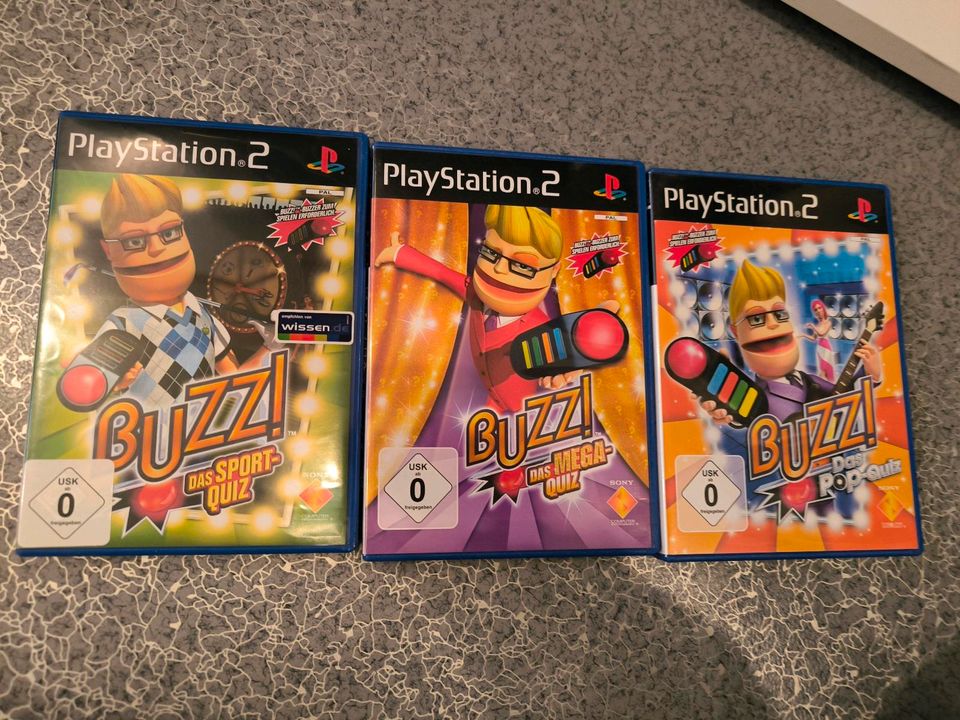 Verschiedene Buzz Quizspiele für Playstation 2  inkl. 4 Buzzer in Hilzingen