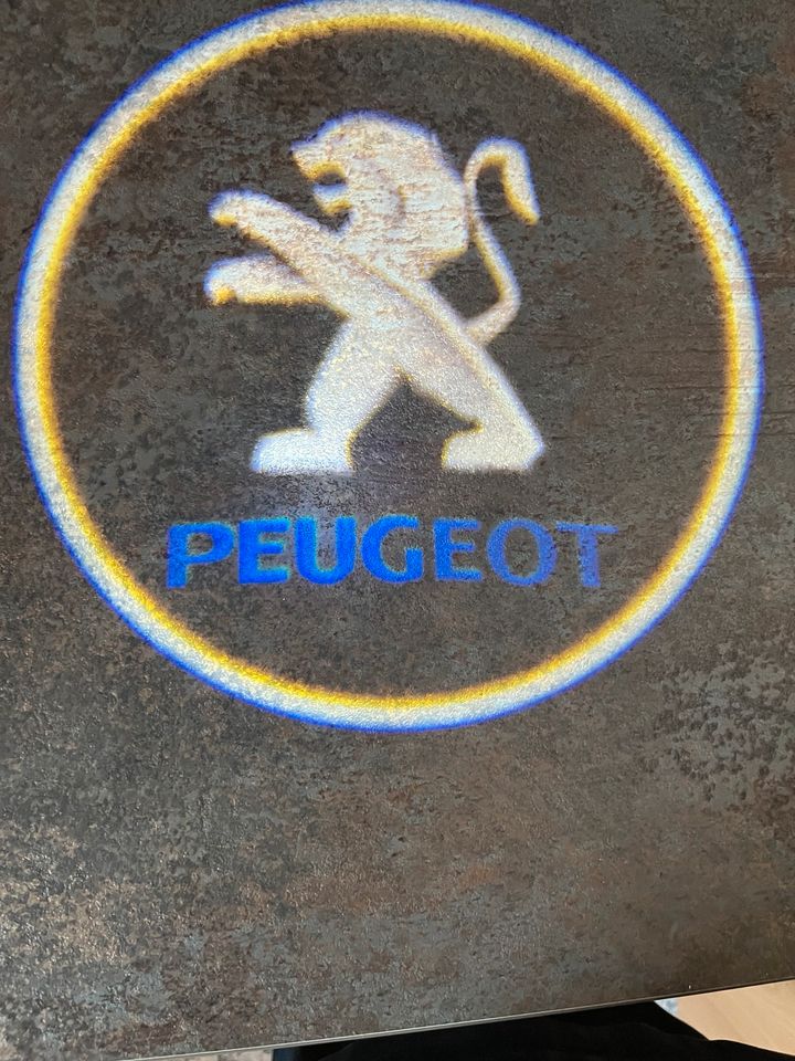 2 Logo Projektor Autotürlicht f. Peugeot in Freiburg im Breisgau