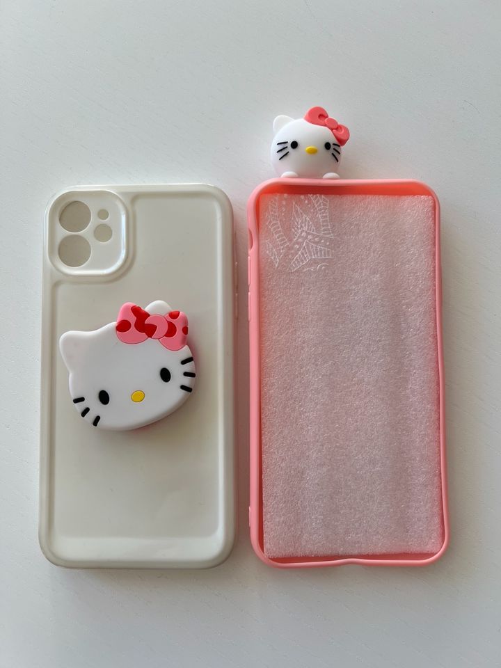 2 x Hello Kitty Case Hülle für IPhone 11 top Zustand bzw. Neu in Biberach an der Riß