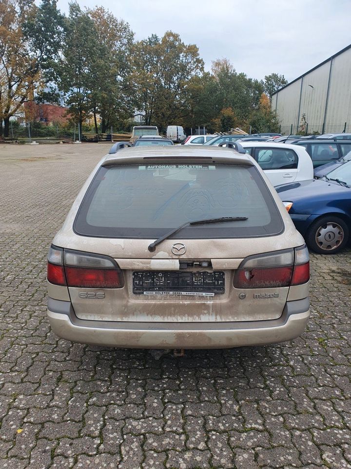 Mazda 626 Schlachtfest Ersatzteile Einzelteile Grau Bj.1998 in Bremervörde