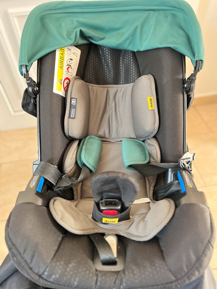 Doona + Babyschale/Kinderwagen in Schleiden