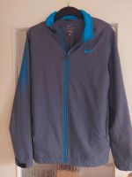 Nike Jacke Sportjacke  grau blau S Hessen - Kassel Vorschau