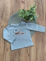 STACCATO BABY LANGARMSHIRT- GRÖSSE 80- MINT-TIGER - GUTER ZUSTAND Nordrhein-Westfalen - Kamen Vorschau