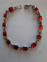 Armband mit 12 rot-orangefarbenen Steinen Nordrhein-Westfalen - Niederzier Vorschau