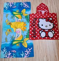 2 Badeponchos Hello Kitty Kreis Ostholstein - Heiligenhafen  Vorschau