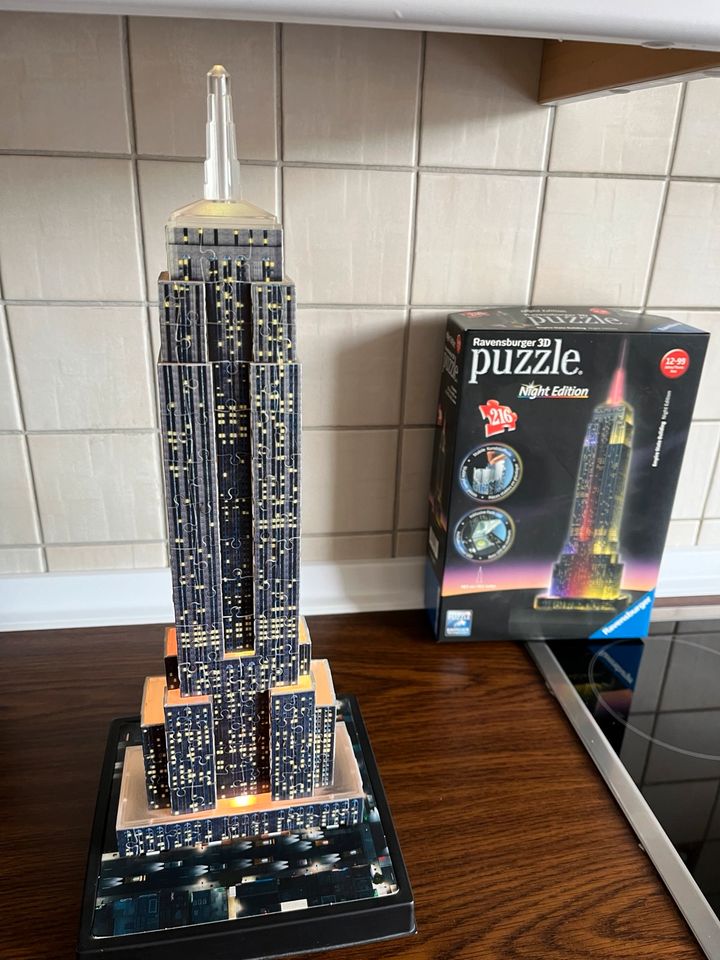 Puzzle Ravensburger 3D Empire State Building Night Edition in Hohenhorn