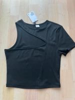 Cropped T-Shirt mit Cut outs Grösse S H&M schwarz Neu mit Etikett Hessen - Dietzenbach Vorschau