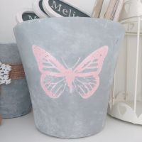 Blumentopf Übertopf grau Schmetterling rosa Beton shabby Niedersachsen - Hermannsburg Vorschau