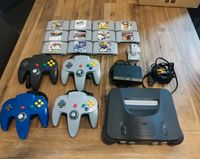 Nintendo 64 mit 4 Controllern und diversen Spielen Hessen - Altenstadt Vorschau