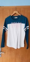 Hollister Langarmshirt Shirt blau rosa weiß Gr. M Niedersachsen - Northeim Vorschau