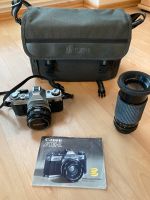 Canon AE-1 Spiegelreflexkamera mit Tokina Teleobjektiv Hessen - Langgöns Vorschau