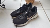 Nike Revolution schwarz bronze Größe 41 Nordrhein-Westfalen - Ahlen Vorschau