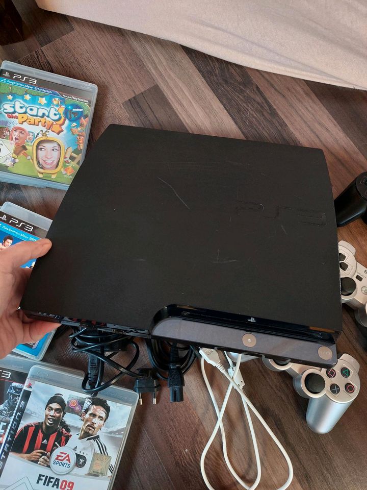 PS3 mit 26 Spielen und 3 Controller in Ispringen