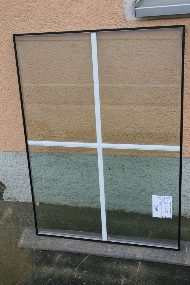 Isolierglasscheiben mit weißen Sprossen im Scheibenzwischenraum in Schönfeld