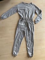 Jumpsuit grau Kr. München - Ismaning Vorschau