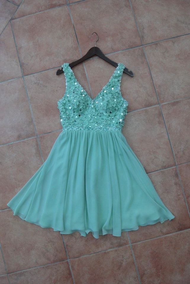 Abendkleid mint von UNIQUE in Gr.34, nur 1x getragen in Bohmte