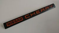 Nissan Datsun Cherry N12 Emblem Schriftzug Leiste Griff Niedersachsen - Weyhe Vorschau