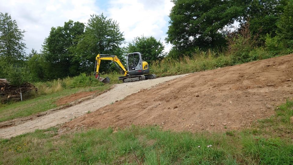 Baggerarbeiten, Erdaushub, Poolbau, Mauerscheibensteine, Arbeiten in Gräfendorf