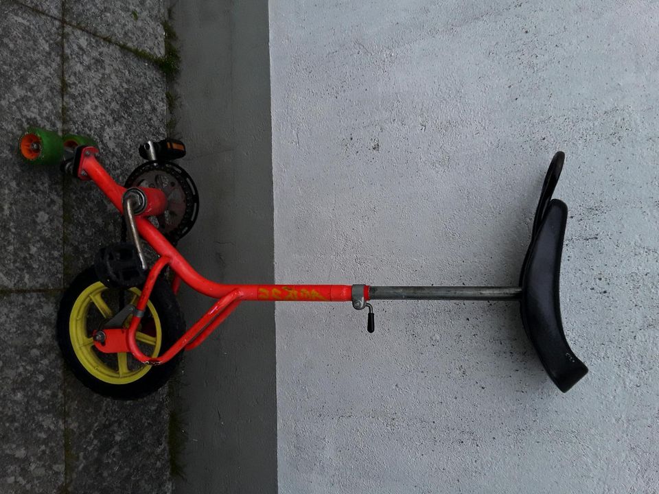 Einrad mit Stützrädern in Ketsch