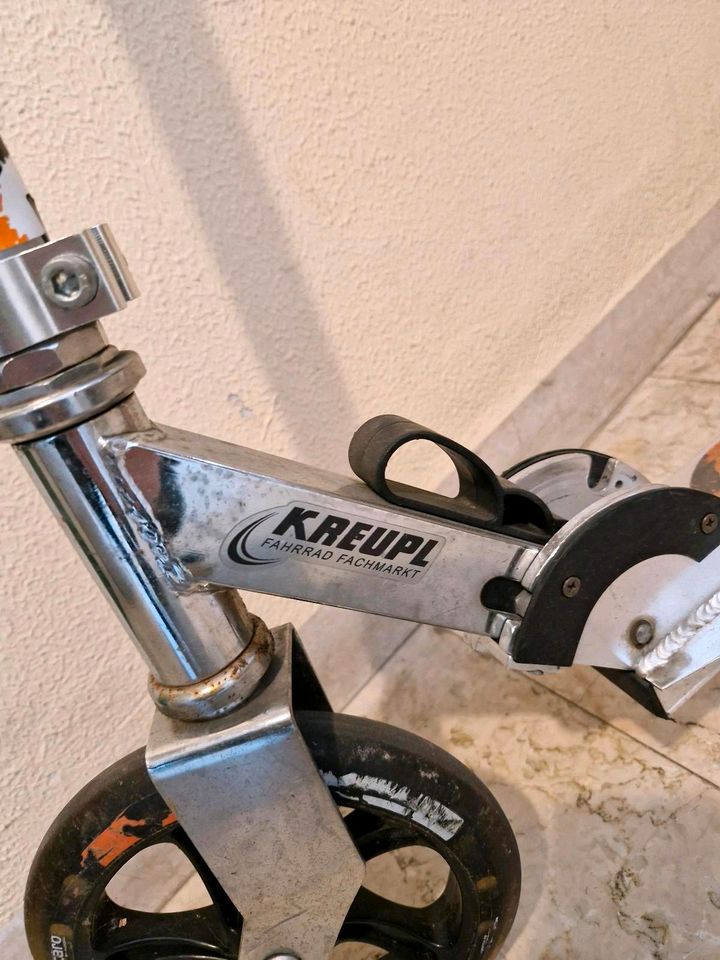 Scooter Roller in orange für Kinder in Weilheim i.OB