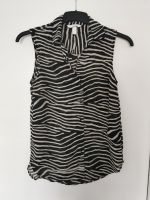 Bluse Leoprint H&M Gr. 34 schwarz / beige Nordrhein-Westfalen - Köln Vogelsang Vorschau