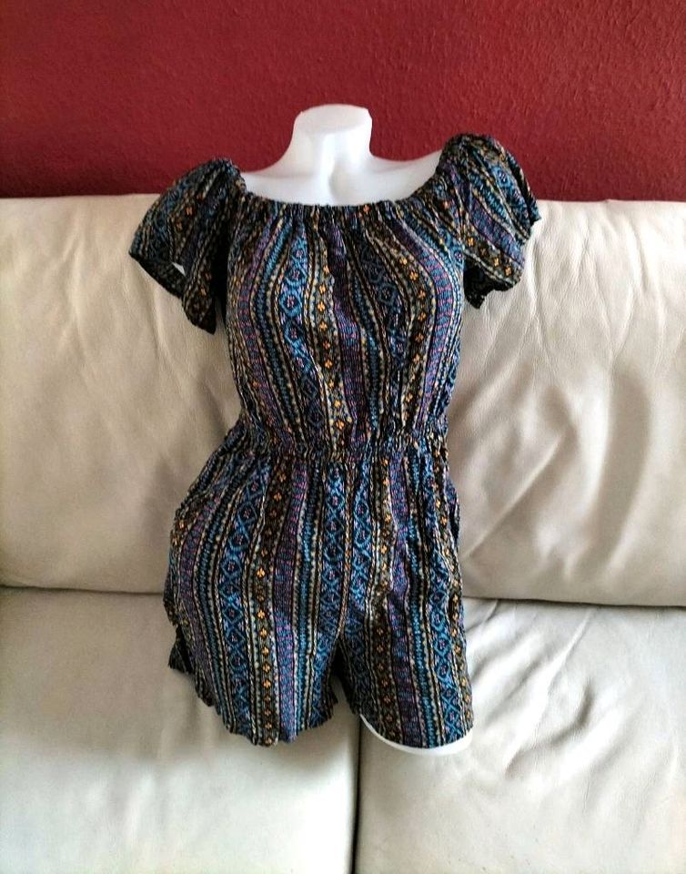 Jumpsuit mit Muster Volantärmel marineblau schwarz violett lila in Schwieberdingen