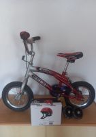 12 Zoll Kinderfahrrad / Fahrrad mit Helm und Stützrädern Sachsen-Anhalt - Bernburg (Saale) Vorschau