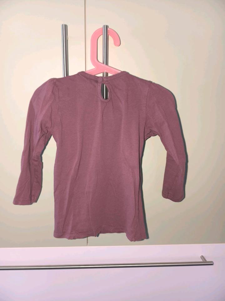 Bordeaux farbener Pullover mit Einhorn in Größe 110 von H&M in Löchgau