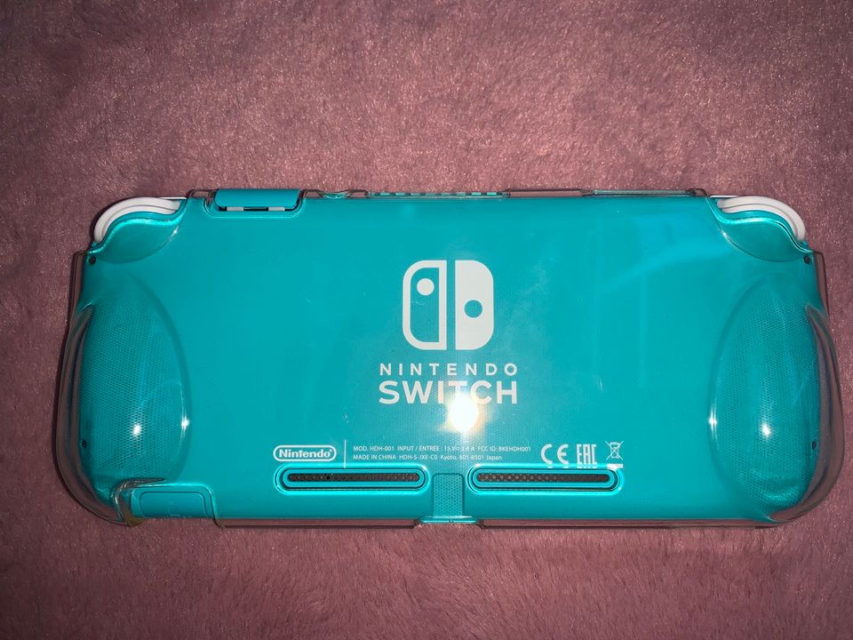 Nintendo Switch Lite Türkis + Zubehör in Berlin