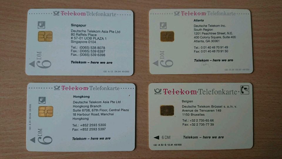Telefonkarten Städte - Singapur, Hongkong, Atlanta, Belgien in Fischbachau