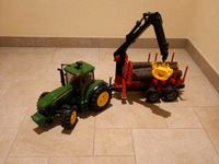 Bruder John Deere Traktor mit Anhänger und Holz Brandenburg - Forst (Lausitz) Vorschau