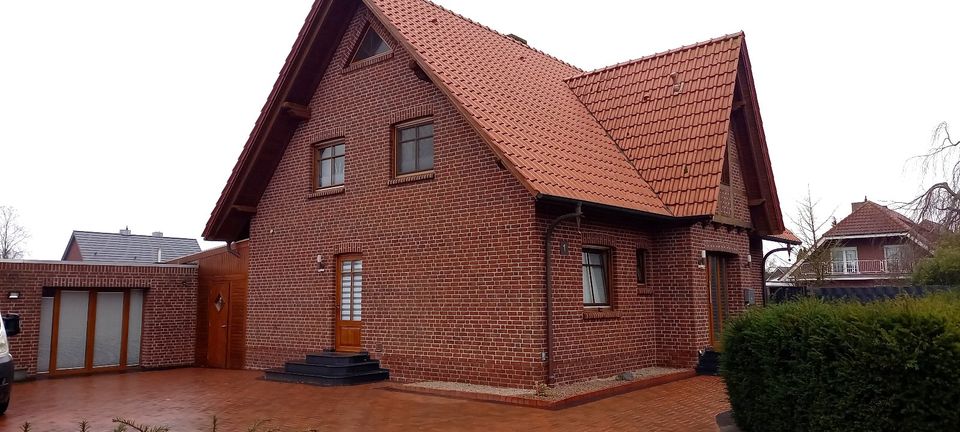 Einfamilienhaus mit großem Garten + Nebengebäude (Gewerbefläche) in Esterwegen