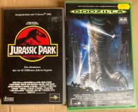 "Jurassic Park" + "Godzilla" VHS Kassetten Niedersachsen - Bruchhausen-Vilsen Vorschau