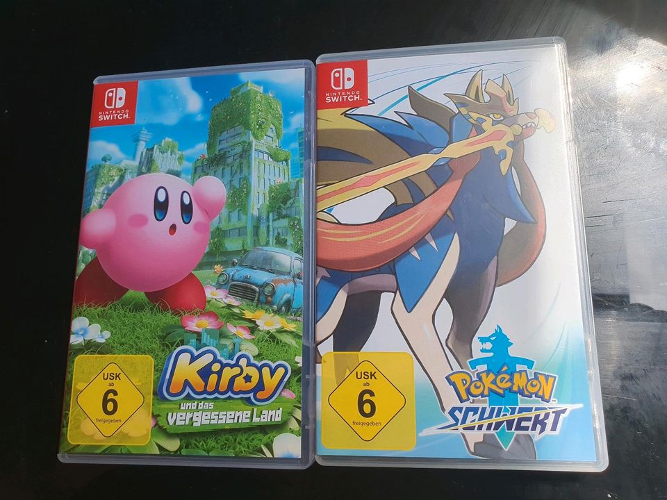 Nintendo Switch mit Kirby Pokemon Schwert in Markkleeberg